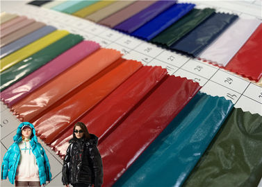 яркая ткань куртки зимы заботы масла PU 100%Nylon покрывая устойчивая легкая